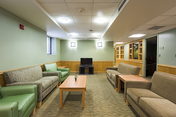 Welch House Community Lounge - couches chairs tv and coffee table